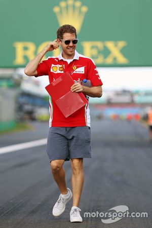 Sebastian Vettel, Ferrari walks the circuit.