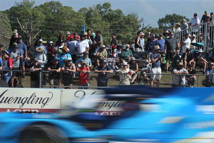 Fans watch the race action