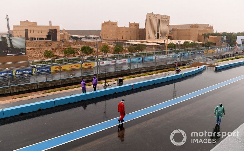 Rain on the circuit, in the pit lane