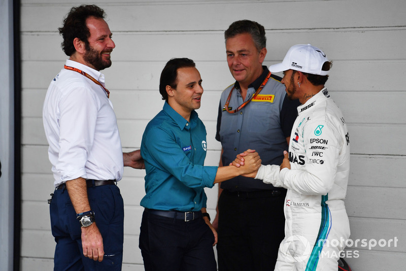 Pole sitter Lewis Hamilton, Mercedes AMG F1 celebrates with Felipe Massa, Matteo Bonciani, FIA Media Delegate and Mario Isola, Pirelli Sporting Director in Parc Ferme