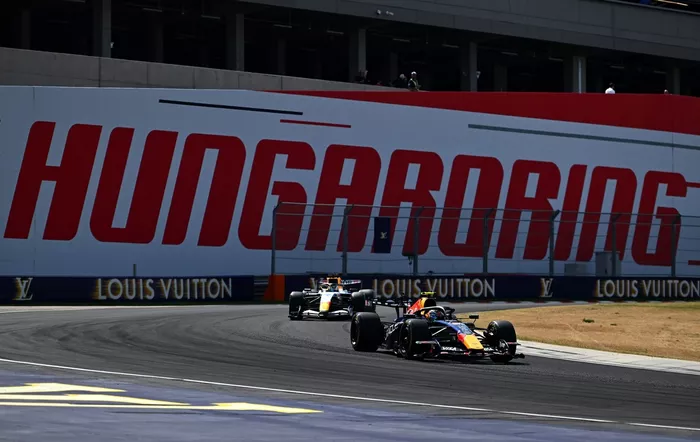 Arvid Lindblad, Racing Bulls; Isack Hadjar, Red Bull Racing