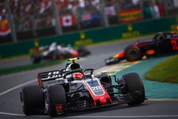 Kevin Magnussen, Haas F1 Team VF-18 Ferrari, a spinning Max Verstappen, Red Bull Racing RB14 Tag Heu