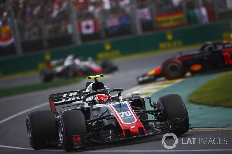 Kevin Magnussen, Haas F1 Team VF-18 Ferrari, a spinning Max Verstappen, Red Bull Racing RB14 Tag Heuer