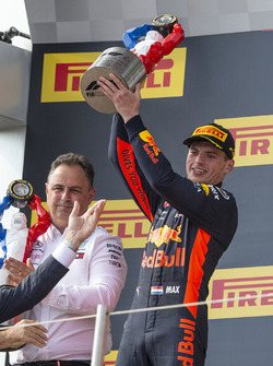 Max Verstappen, Red Bull Racing celebrates on the podium with the trophy