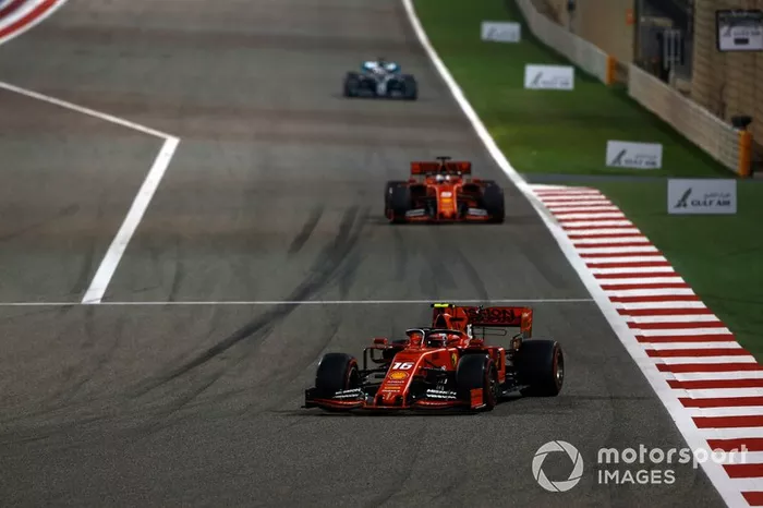 Charles Leclerc, Ferrari SF90, leads Sebastian Vettel, Ferrari SF90, and Lewis Hamilton, Mercedes AMG F1 W10