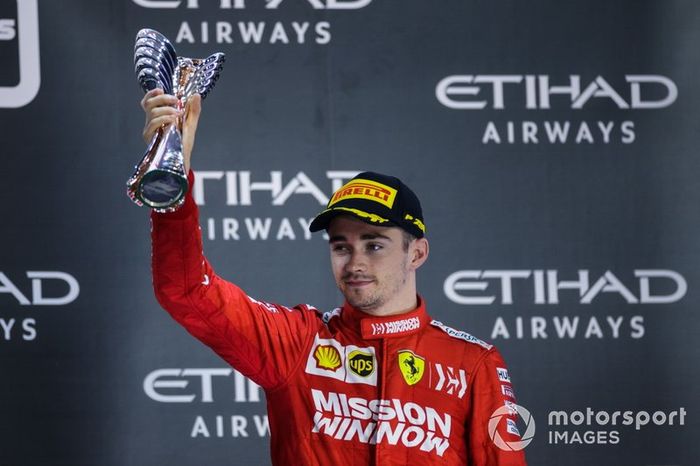 Charles Leclerc, Ferrari, 3rd position, on the podium with his trophy