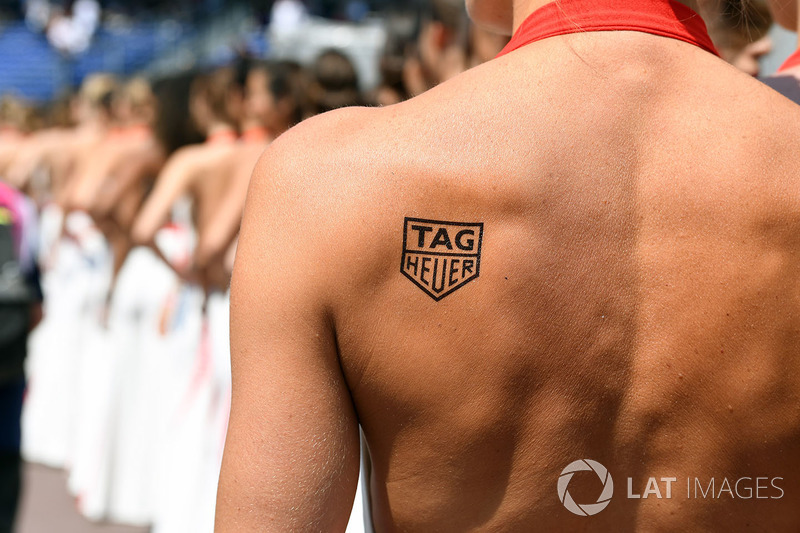 Grid girl with Tag Heuer tattoo