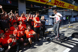 Romain Grosjean, Haas F1 Team, and the Haas F1 team celebrate the team's best finish to date