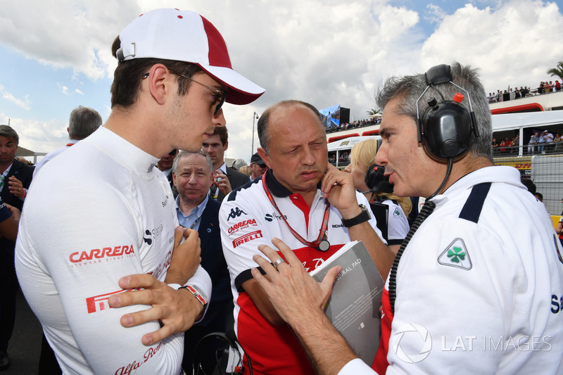 Charles Leclerc, Sauber, Frederic Vasseur, Sauber, Team Principal and Xevi Pujolar, Sauber Head of Track Engineering on the grid