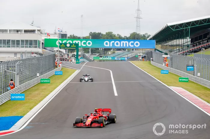 Charles Leclerc, Ferrari SF1000 and Daniil Kvyat, AlphaTauri AT01 