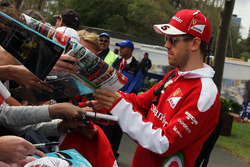 Sebastian Vettel, Ferrari signs autographs for the fans