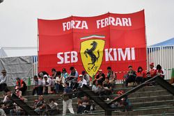 Sebastian Vettel, Ferrari fans and banner