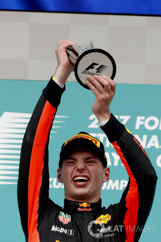 Max Verstappen, Red Bull Racing, race winner, lifts his trophy on the podium