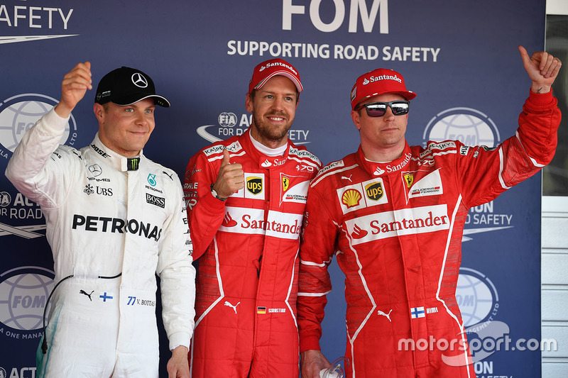 Ganador de la pole Sebastian Vettel, Ferrari, segundo lugar Kimi Raikkonen, Ferrari y el tercero Valtteri Bottas, Mercedes AMG F1