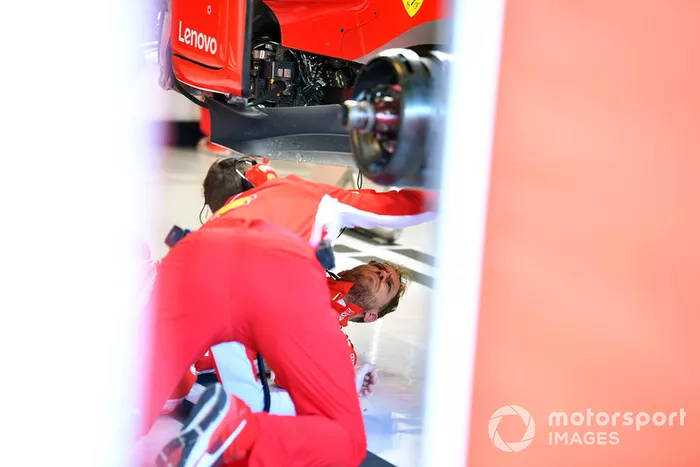 Sebastian Vettel, Ferrari on the garage floor under the Ferrari SF71H