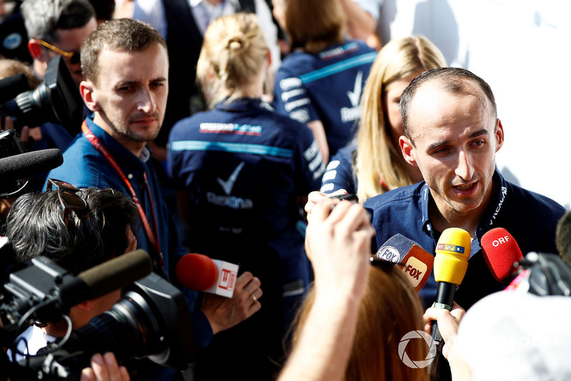 Robert Kubica, Williams Racing, talks to the press