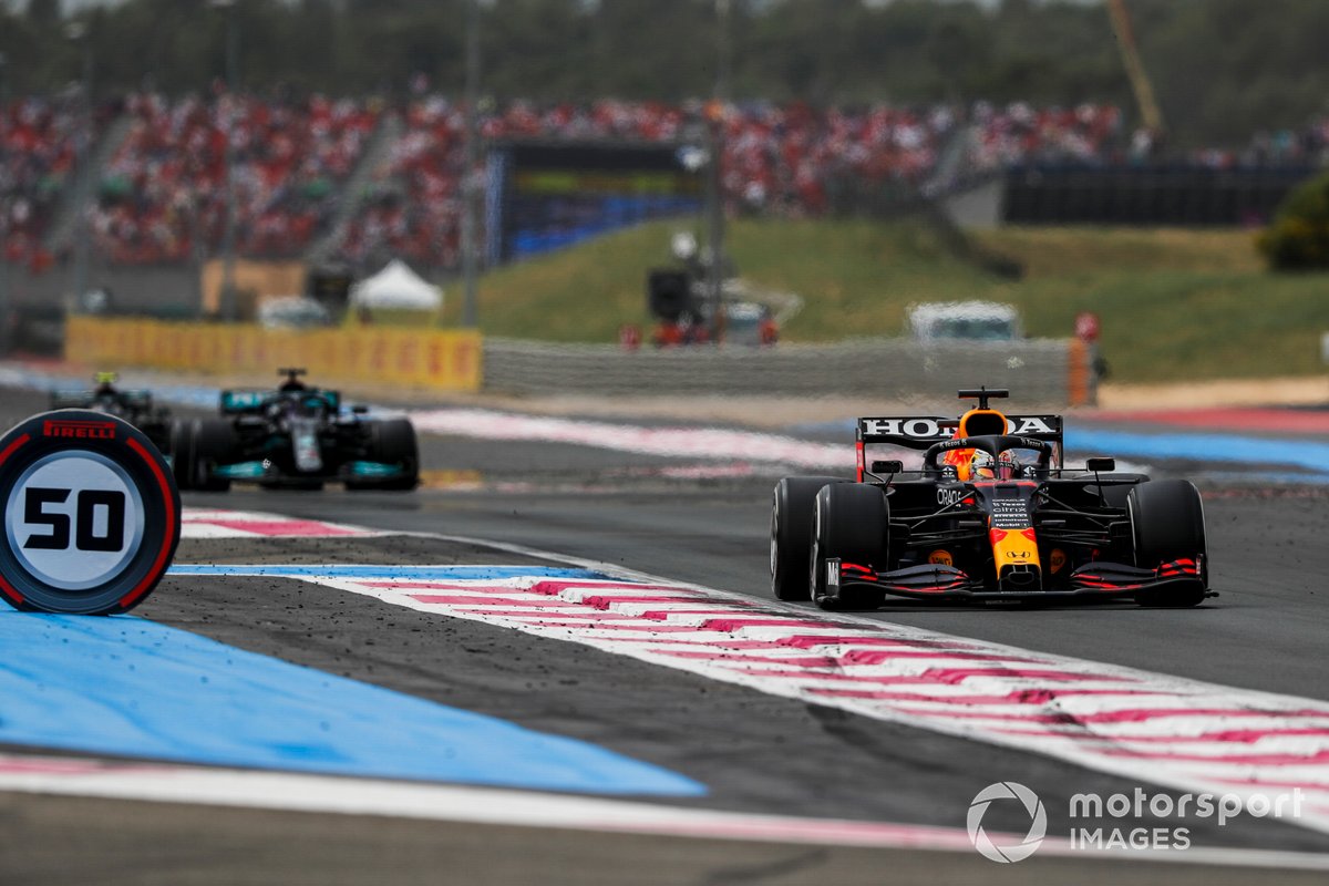 Max Verstappen, Red Bull Racing RB16B, leads Sir Lewis Hamilton, Mercedes W12