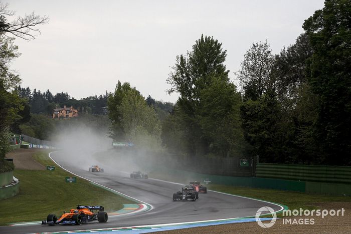 Daniel Ricciardo, McLaren MCL35M, Pierre Gasly, AlphaTauri AT02, and Carlos Sainz Jr., Ferrari SF21