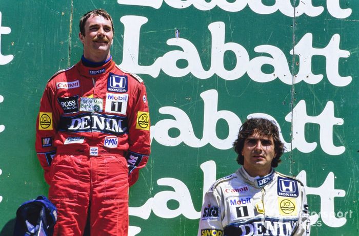 Nigel Mansell, 1º, y Nelson Piquet, 3º, en el podio.