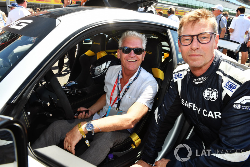 Bernd Maylander, FIA Safety Car Driver and Philip Schofield, on the grid