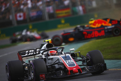 Kevin Magnussen, Haas F1 Team VF-18 Ferrari, a spinning Max Verstappen, Red Bull Racing RB14 Tag Heuer