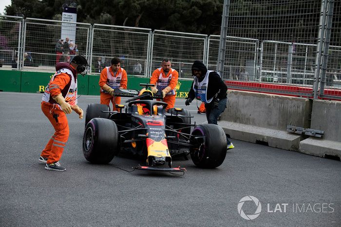 The carshed car of Daniel Ricciardo, Red Bull Racing RB14 is recovered