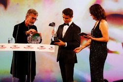 Eddie Jordan presents Lando Norris with the National Driver of the Year award