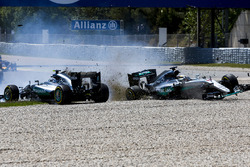 Lewis Hamilton, Mercedes AMG F1 W07 Hybrid and Nico Rosberg, Mercedes AMG F1 W07 Hybrid collide on the opening lap of the race