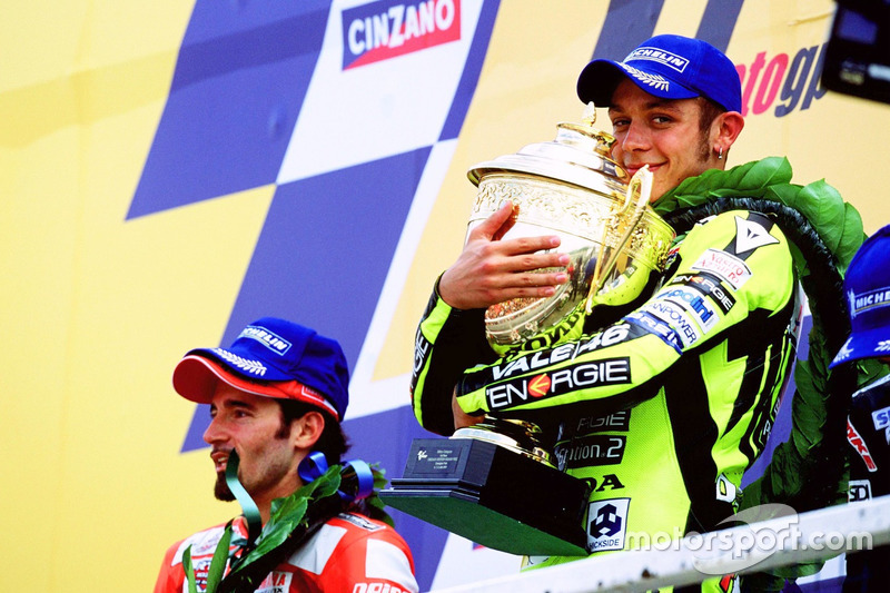 Podium: winner Valentino Rossi, Honda Team, second place Max Biaggi, Yamaha Team