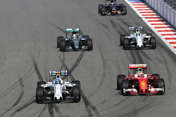 Valtteri Bottas, Williams FW38 and Kimi Raikkonen, Ferrari SF16-H battle for position