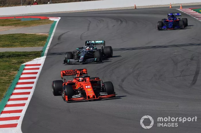 Charles Leclerc, Ferrari SF90 leads Lewis Hamilton, Mercedes-AMG F1 W10