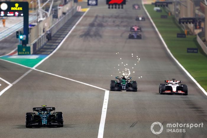 Fernando Alonso, Aston Martin AMR23, Kevin Magnussen, Haas VF-23, George Russell, Mercedes F1 W14