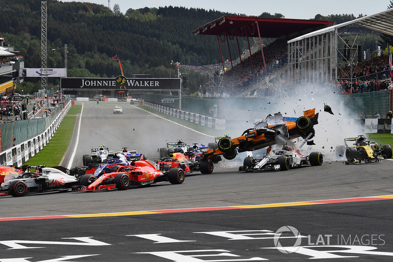 Fernando Alonso, McLaren MCL33 crashes and gets airborne at the start of the race