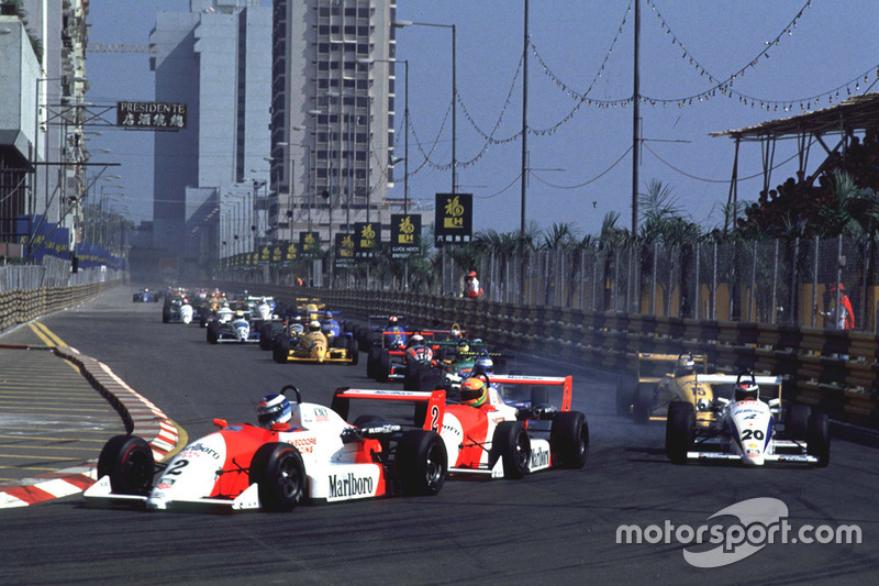 Mika Hakkinen leads Eddie Irvine and Michael Schumacher at the start of the race