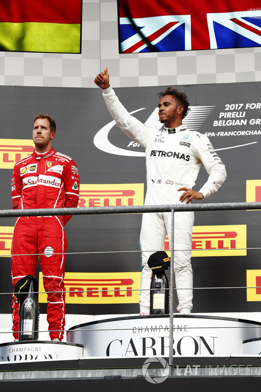 Lewis Hamilton, Mercedes AMG F1 alongside Sebastian Vettel, Ferrari