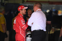 Sebastian Vettel, Ferrari and Ross Brawn, Formula One Managing Director of Motorsports in parc ferme