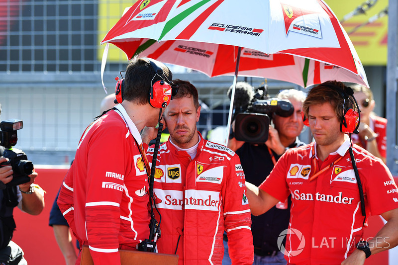 Sebastian Vettel, Ferrari, Riccardo Adami, Ferrari Race Engineer and Antti Kontsas, trainer