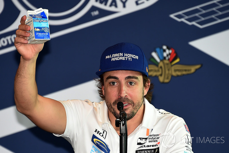 Fernando Alonso, Andretti Autosport Honda holds his version of the milk after retiring from the race