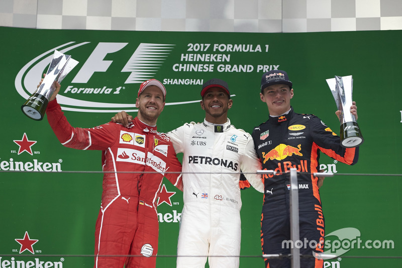 Podium: second place Sebastian Vettel, Ferrari, Aldo Costa, Engineering Director, Mercedes AMG, Race winner Lewis Hamilton, Mercedes AMG, third place Max Verstappen, Red Bull Racing on the podium