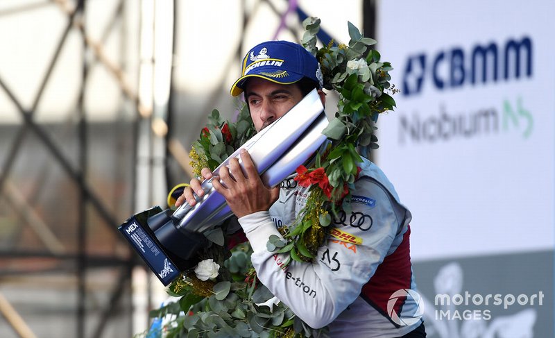 Race winner Lucas Di Grassi, Audi Sport ABT Schaeffler kisses his trophy on the podium