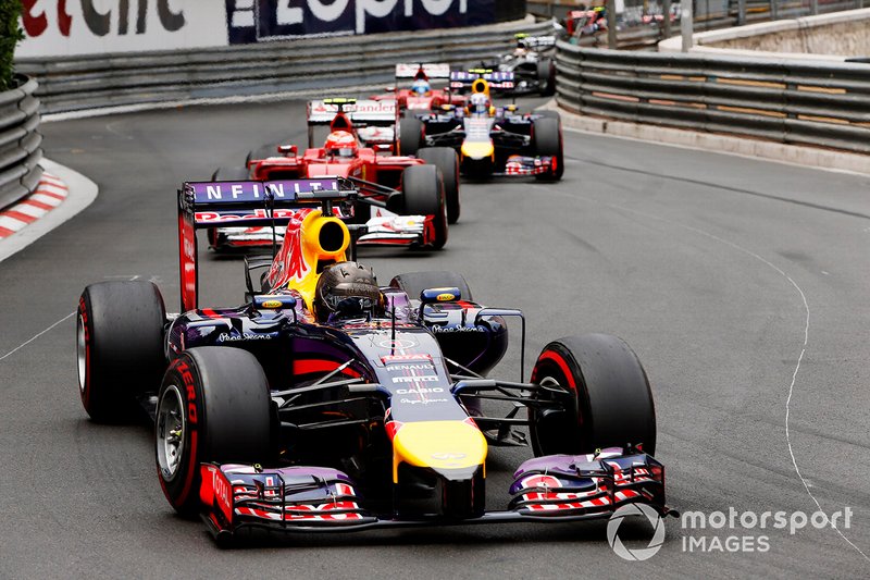 Sebastian Vettel, Red Bull Racing RB10 Renault, leads Kimi Raikkonen, Ferrari F14T, Daniel Ricciardo, Red Bull Racing RB10 Renault, and Fernando Alonso, Ferrari F14T