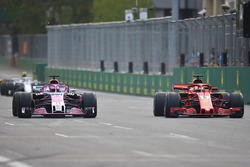 Sebastian Vettel, Ferrari SF71H and Sergio Perez, Force India VJM11