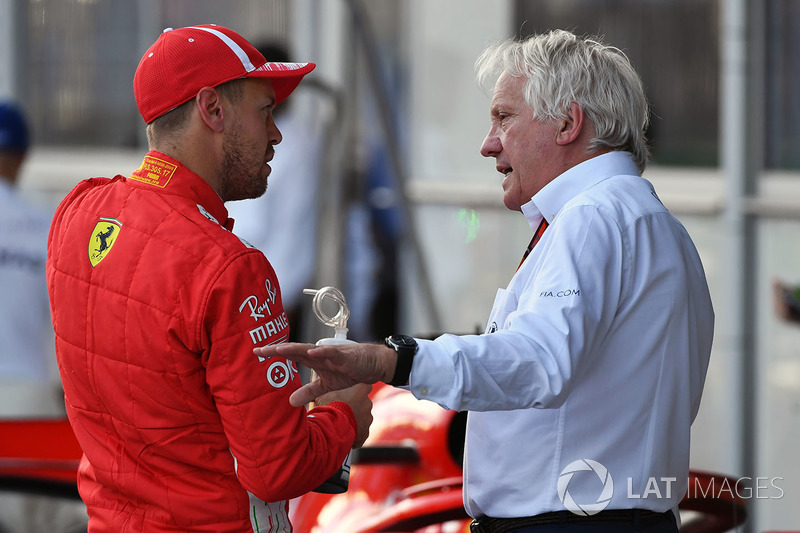 Sebastian Vettel, Ferrari and Charlie Whiting, FIA Delegate