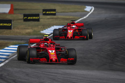 Kimi Raikkonen, Ferrari SF71H leads Sebastian Vettel, Ferrari SF71H