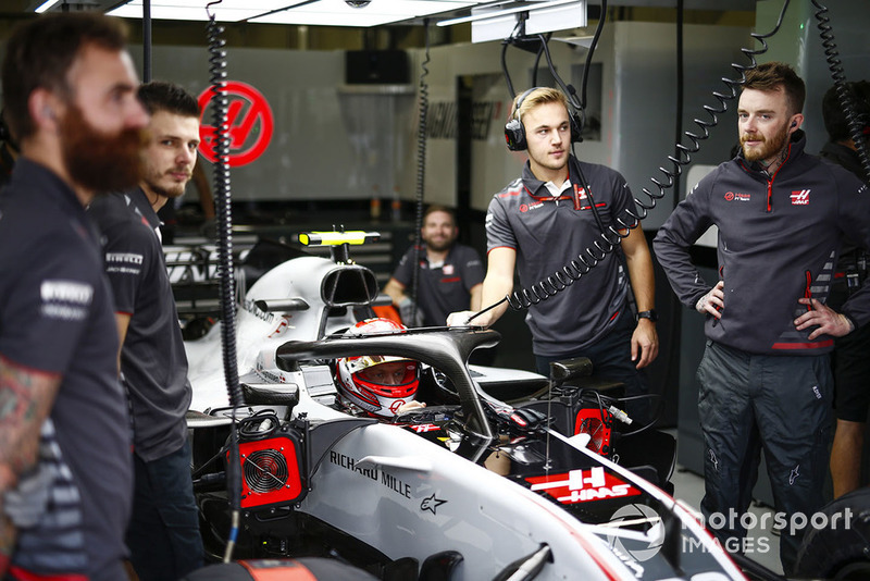Kevin Magnussen, Haas F1 Team, in cockpit, in the team's garage