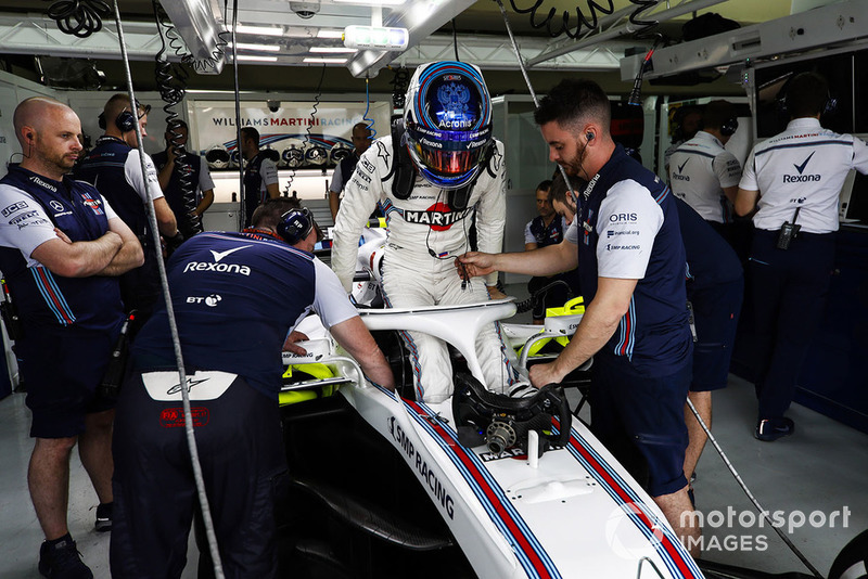 Sergey Sirotkin, Williams Racing, enters his cockpit in the garage