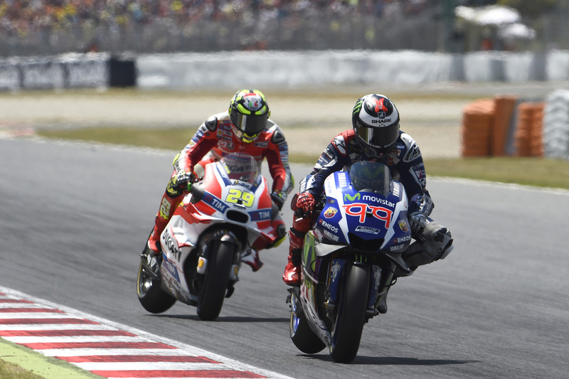 Jorge Lorenzo, Yamaha Factory Racing just before Andrea Iannone, Ducati Team crashes in to him