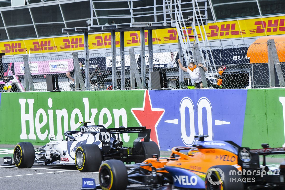 Pierre Gasly, AlphaTauri AT01, 1st position, takes victory ahead of Carlos Sainz Jr., McLaren MCL35, 2nd position