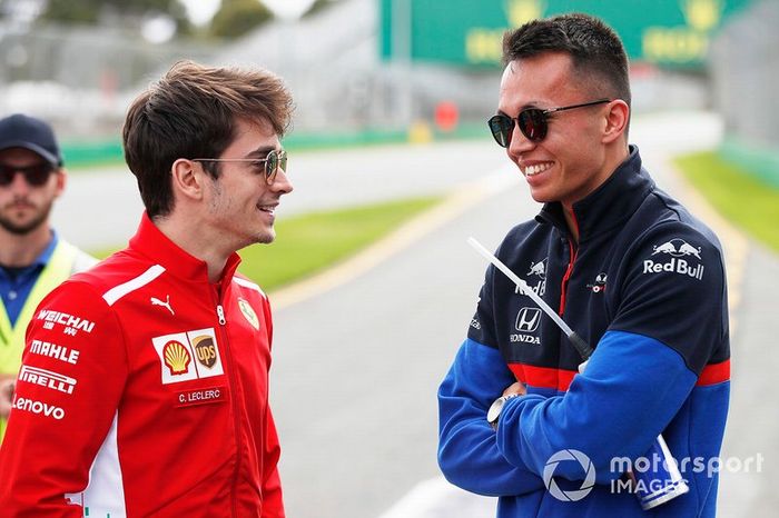 Charles Leclerc, Ferrari, y Alexander Albon, Scuderia Toro Rosso