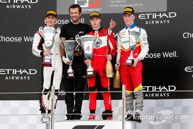 Jake Hughes, ART Grand Prix, Nikita Mazepin, ART Grand Prix, and Simo Laaksonen, Campos Racing, celebrate on the podium